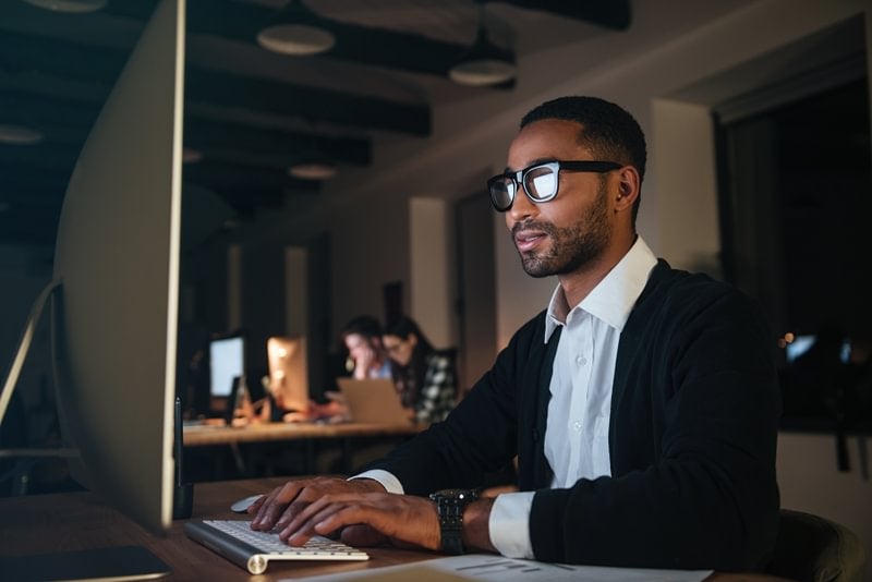 A data scientist working on their computer.