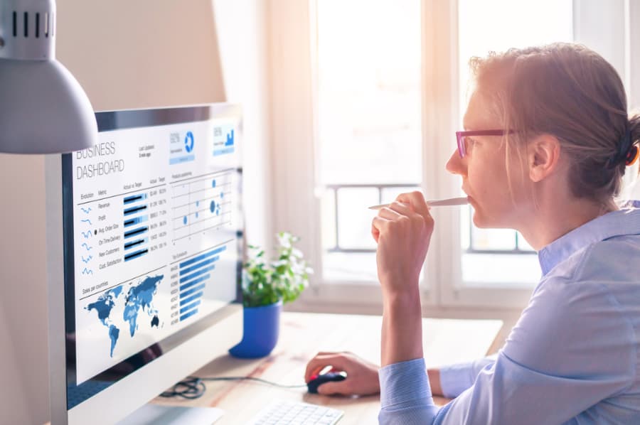 Woman studying business online 