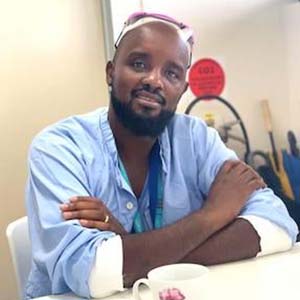 Portrait of Bosco Ntuyenab, a graduate of James Cook University.